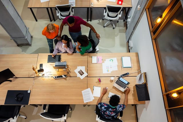 People around office desk