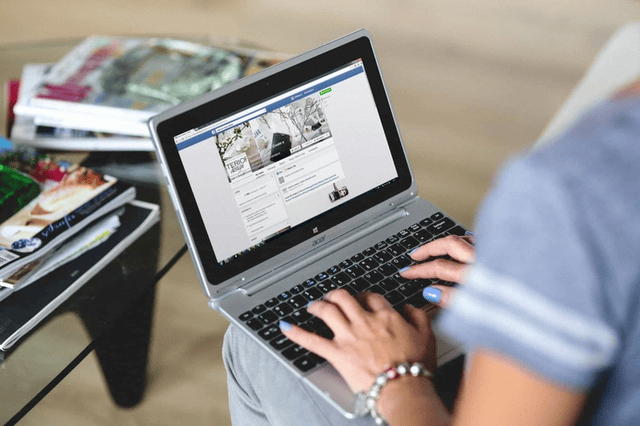 women typing on the notebook