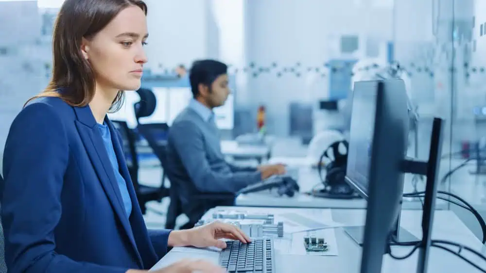 IT assistant working on personal computer