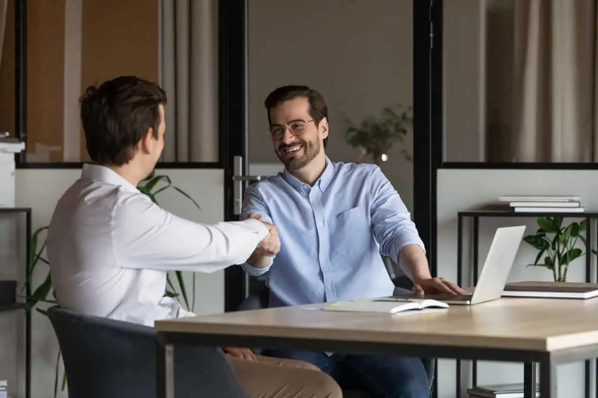 Recruiter hiring candidate after the successful job interview.