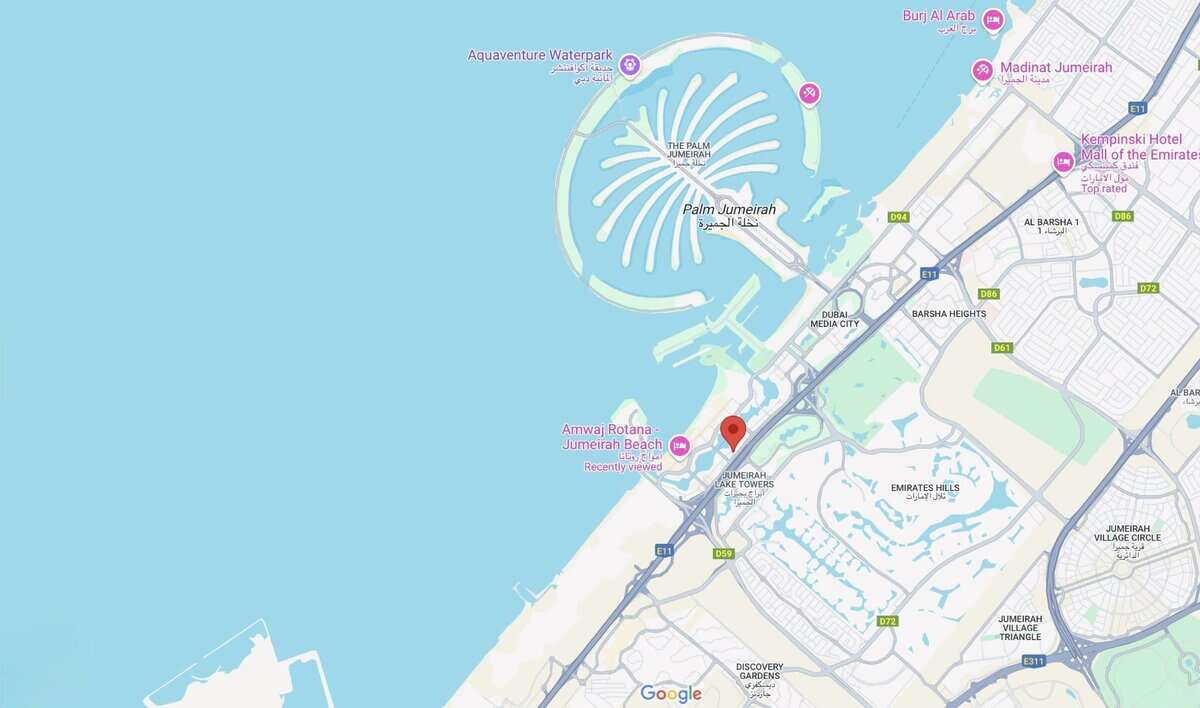 Map showing Dubai Marina area with a pin on Marina Plaza, DevsData LLC office location. testimonial