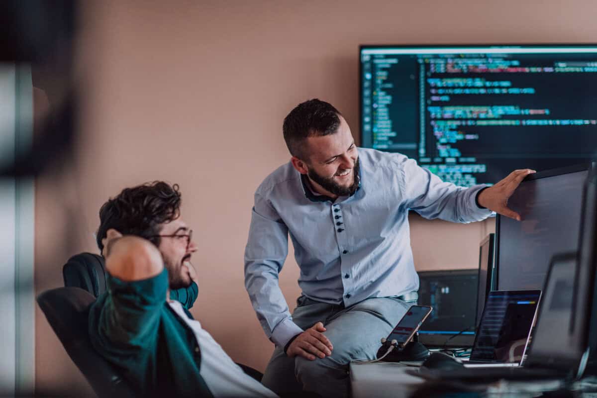 Nearshore team working on computer testimonial