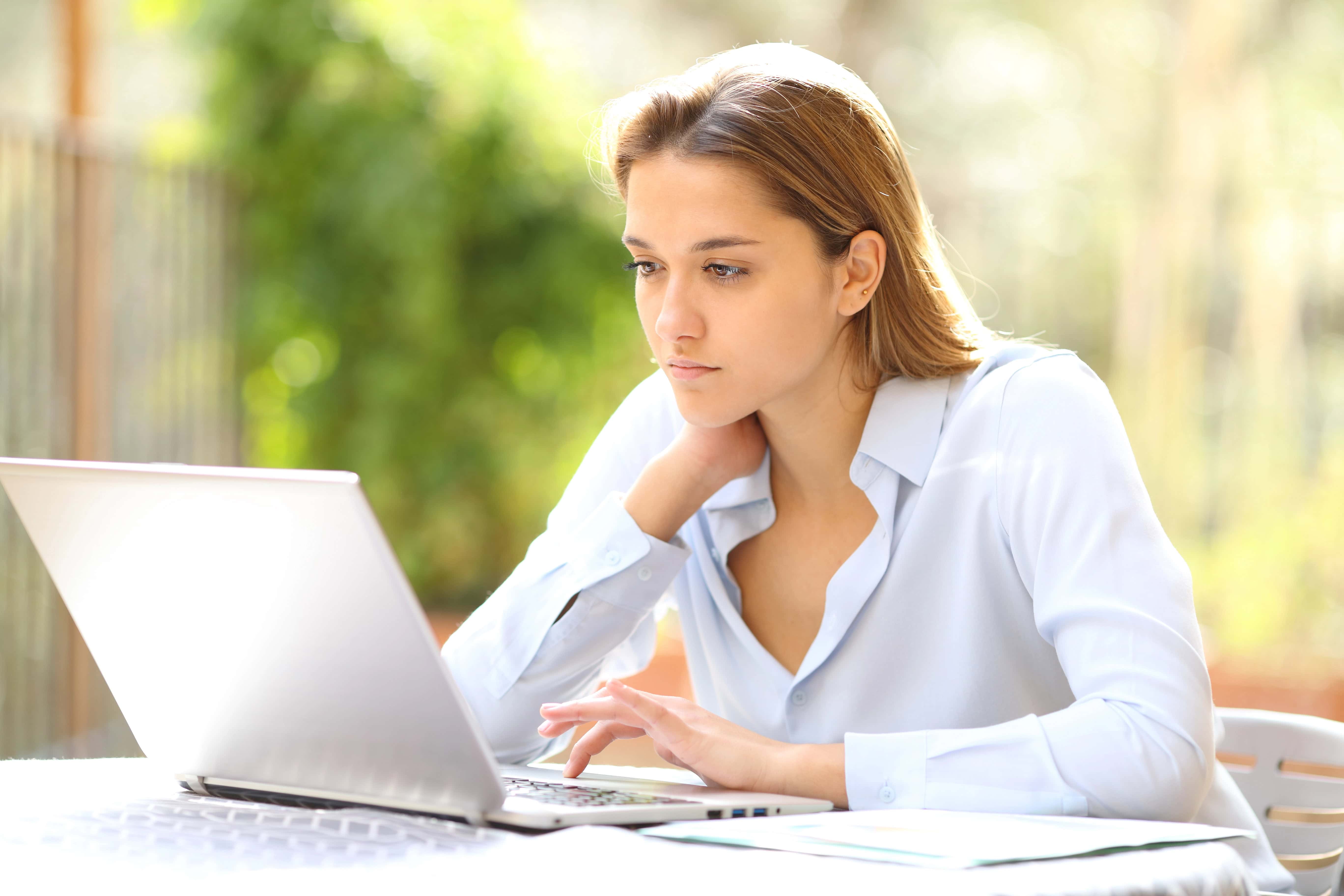 Woman working with laptop testimonial