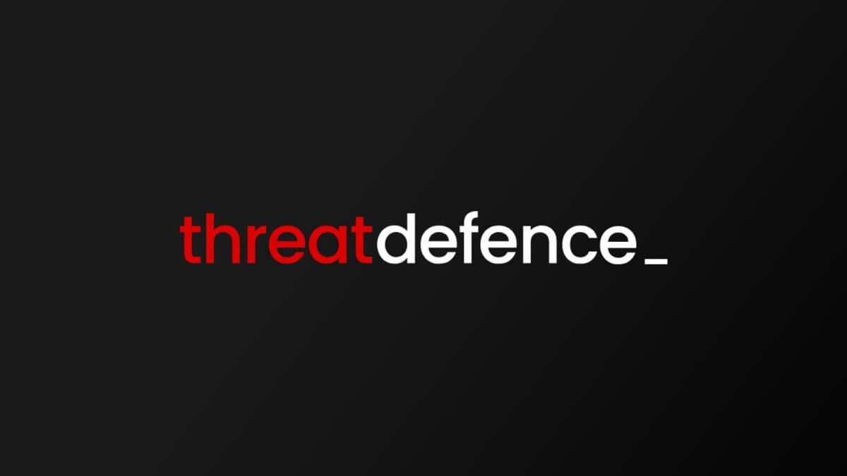 ThreatDefence logo displayed in red and white text on a sleek, dark background. testimonial