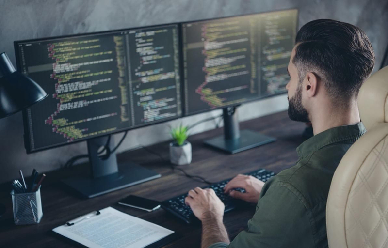 Developer working on the laptop